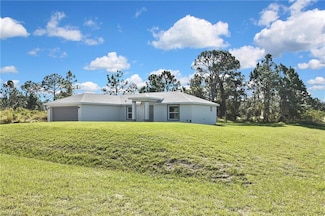 902 Lytle St E, Lehigh Acres, FL 33974