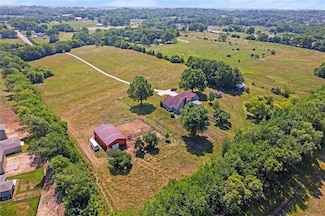 1116 N Madison St, Raymore, MO 64083