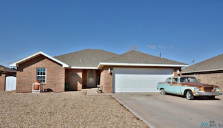 1129 Aquarius Dr, Portales, NM 88130