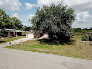 215 Redcliff Ave, Lehigh Acres, FL 33936