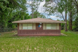 201 Ivanhoe Dr E, Woodville, TX 75979