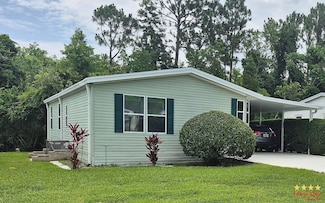 279 Woodside Lake Dr, Ormond Beach, FL 32174