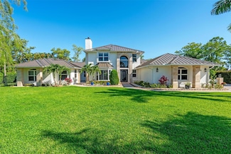 15995 Meadow Wood Dr, Wellington, FL 33414