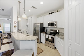 1330 Sweetwater Cove Unit 102, Naples, FL 34110