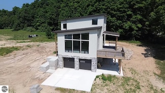 136 Mooney Way, Kewadin, MI 49648