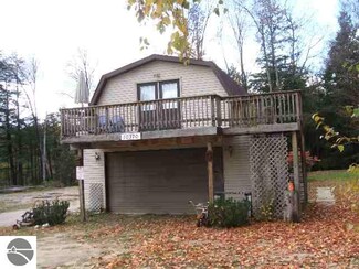 10370 SW Torch Lake Dr, Rapid City, MI 49676