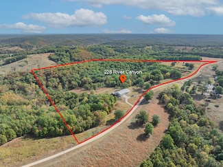 228 River Canyon Rd, MacKs Creek, MO 65786