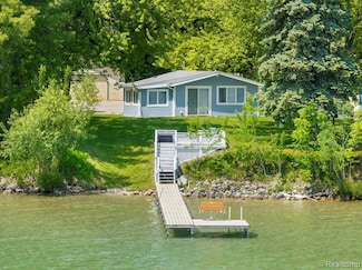 4037 N West Torch Lake Dr, Kewadin, MI 49648