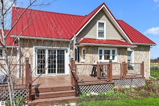 4652 Cairn Hwy, Kewadin, MI 49648