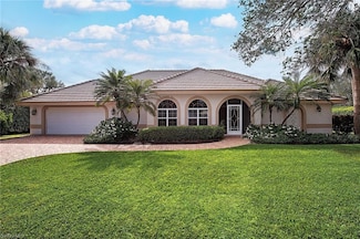 702 Willowwood Ln, Naples, FL 34108