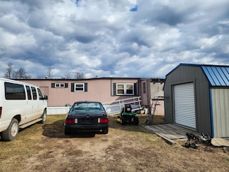 7644 E 2-1 2 Mile Rd, Luther, MI 49656