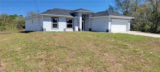 1025 Pilgrim St E, Lehigh Acres, FL 33974