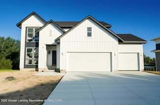 606 Launch Point Dr, Perry, MI 48872