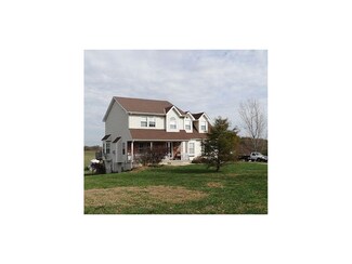 410 E Neil Chiles Rd, Buckner, MO 64016