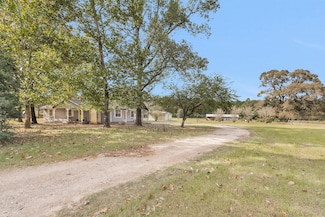 13585 Walker Rd, Willis, TX 77378