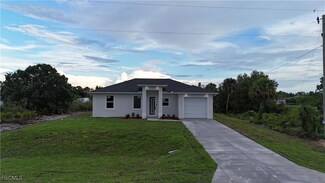 1075 Barnett St E, Lehigh Acres, FL 33974