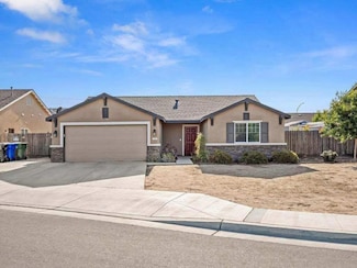 703 Tulip Cir, Dinuba, CA 93618