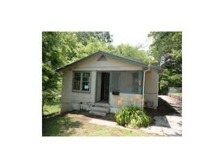 128 S High St, Sugar Creek, MO 64054