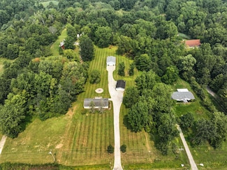 7744 Puttygut Rd, Casco, MI 48064
