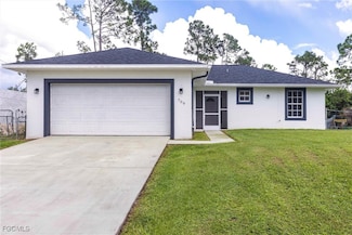 709 Puccini Ave S, Lehigh Acres, FL 33974