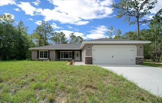 9195 N Athens Dr, Citrus Springs, FL 34433