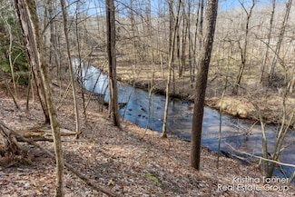 758 Honey Creek Ave NE, Ada, MI 49301