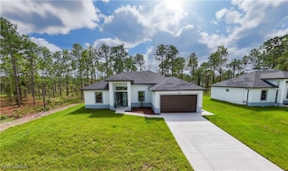 932 Maddock St E, Lehigh Acres, FL 33974