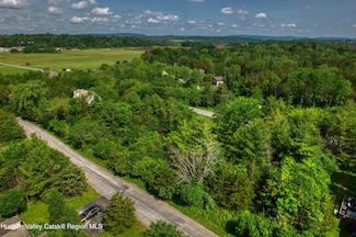 135 Haunted Cir, Sleepy Hollow Lake, NY 12015