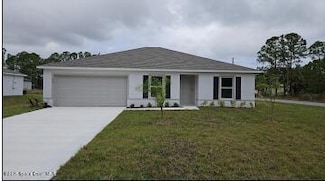 699 Flynn St SE, Palm Bay, FL 32909