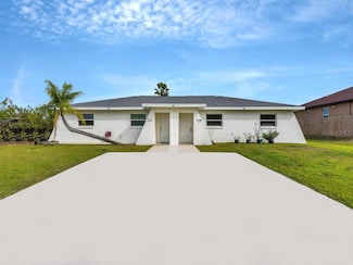 733 Gilbert Ave S, Lehigh Acres, FL 33973