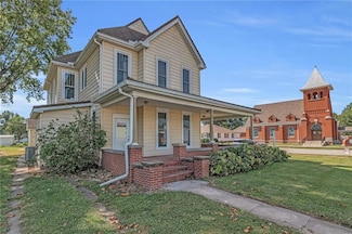 100 E 3rd St, Norborne, MO 64668