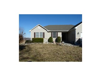 303 S Truman Rd, Archie, MO 64725