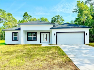 8120 N Maltese Dr, Citrus Springs, FL 34433