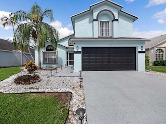 126 Hammocks Ct, Greenacres, FL 33413