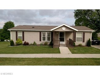126 Mill St SW, Sugar Creek, OH 44681