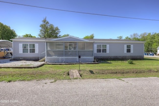 203 W Burch St, Carterville, MO 64835