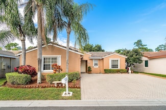 156 Caribe Ct, Greenacres, FL 33413