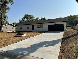 1206 N Tucker St, Nevada, MO 64772