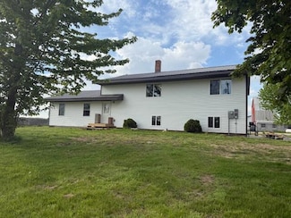 8470 Skeels Rd, Holton, MI 49425