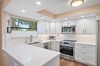 700 Uno Lago Dr Unit 201, Juno Beach, FL 33408