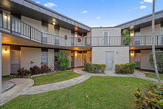 2 Greenway Village N Unit 109, Royal Palm Beach, FL 33411