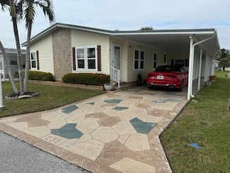 235 Robelina Palm Ln, Naples, FL 34114