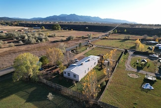 22 Tom Holder Rd, Ranchos de Taos, NM 87557