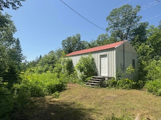 N4996 Ford Lake Rd, Mueller Township, MI 49836