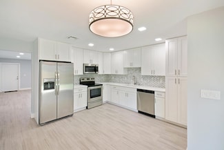 9126 Roan Ln, West Palm Beach, FL 33403