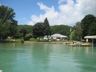 12225 SW Torch Lake Dr, Rapid City, MI 49676