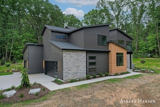 8332 Ramsdell Dr NE, Rockford, MI 49341