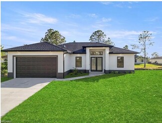 825 Frederick Reid St E, Lehigh Acres, FL 33974