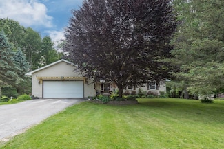 7715 Marquis Dr, Dexter, MI 48130
