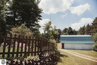 11268 Watson Rd, Williamsburg, MI 49690